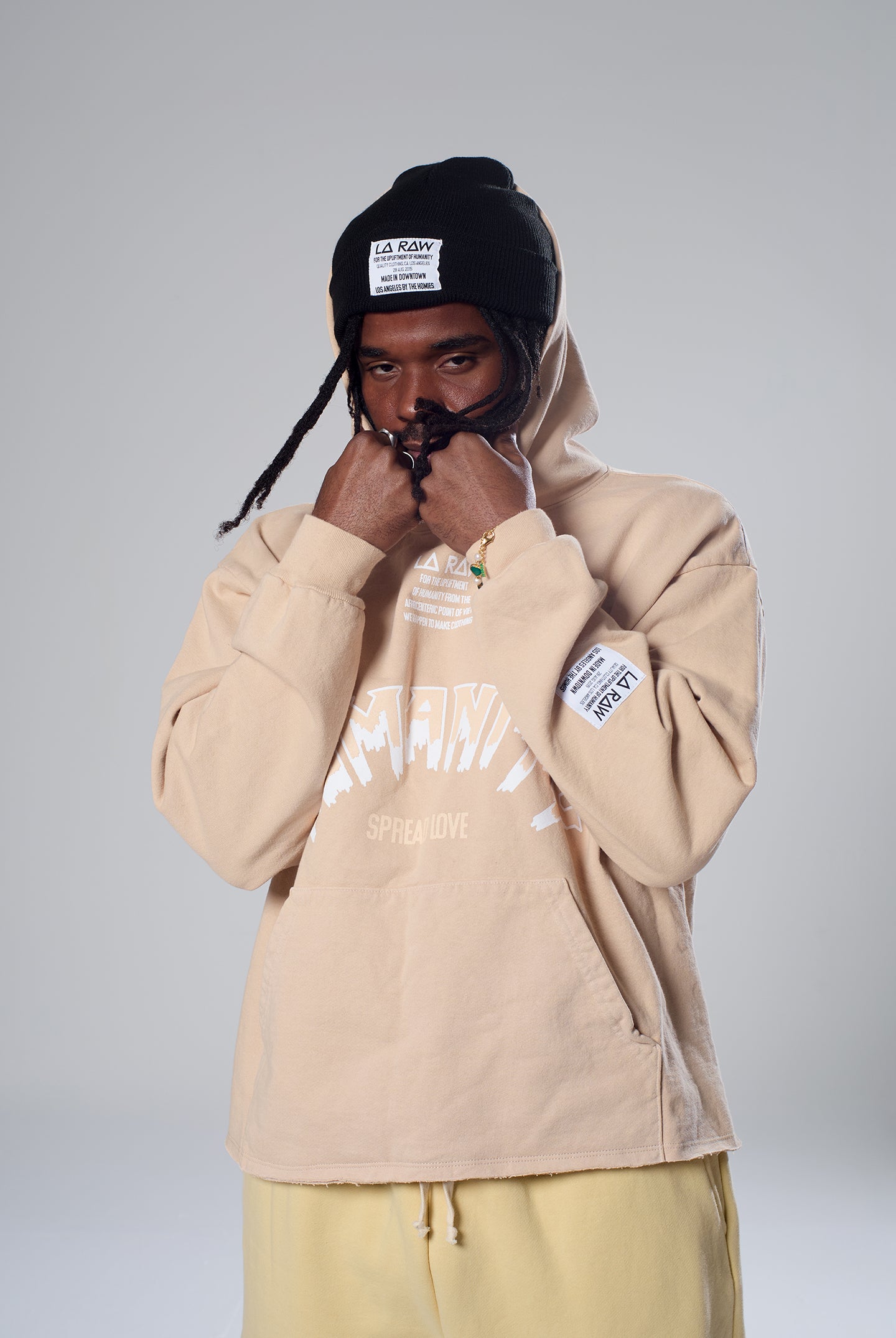 HUMANITY CROP HOODIE TAN LARAW